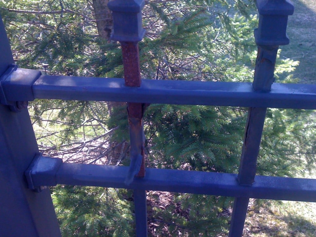 Peeling Finish on a Non-Galvanized Iron Fence