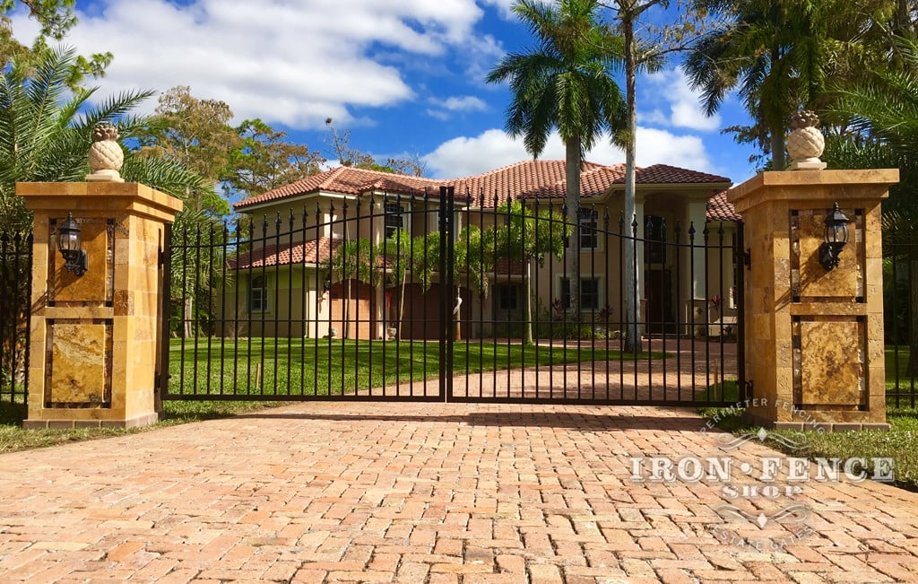 Stronghold Iron Driveway Gate in Classic Style Attached to Stone Columns