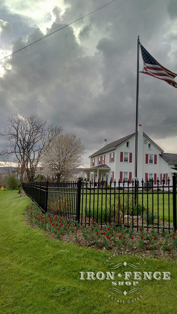 Aluminum Fence Installed Along  Curved Landscaping