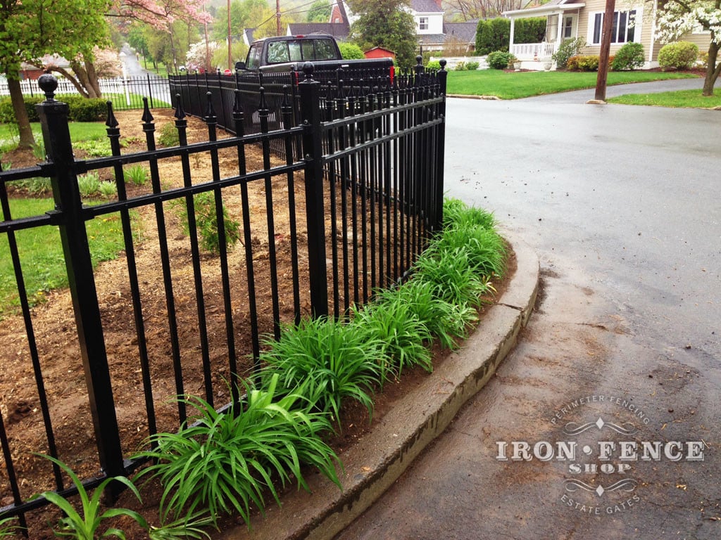 Aluminum Fence Angled Around a Curb