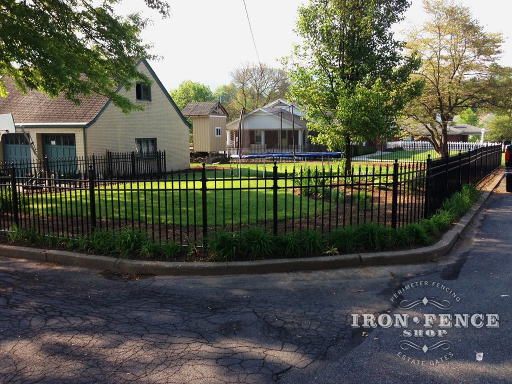 Aluminum Fence Installed Along a Curved Curb