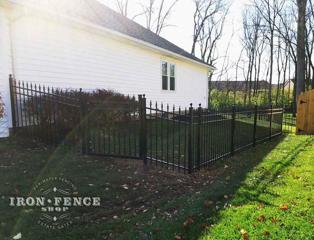 A Racked Infinity Aluminum Fence Panel and Stepped Gate 