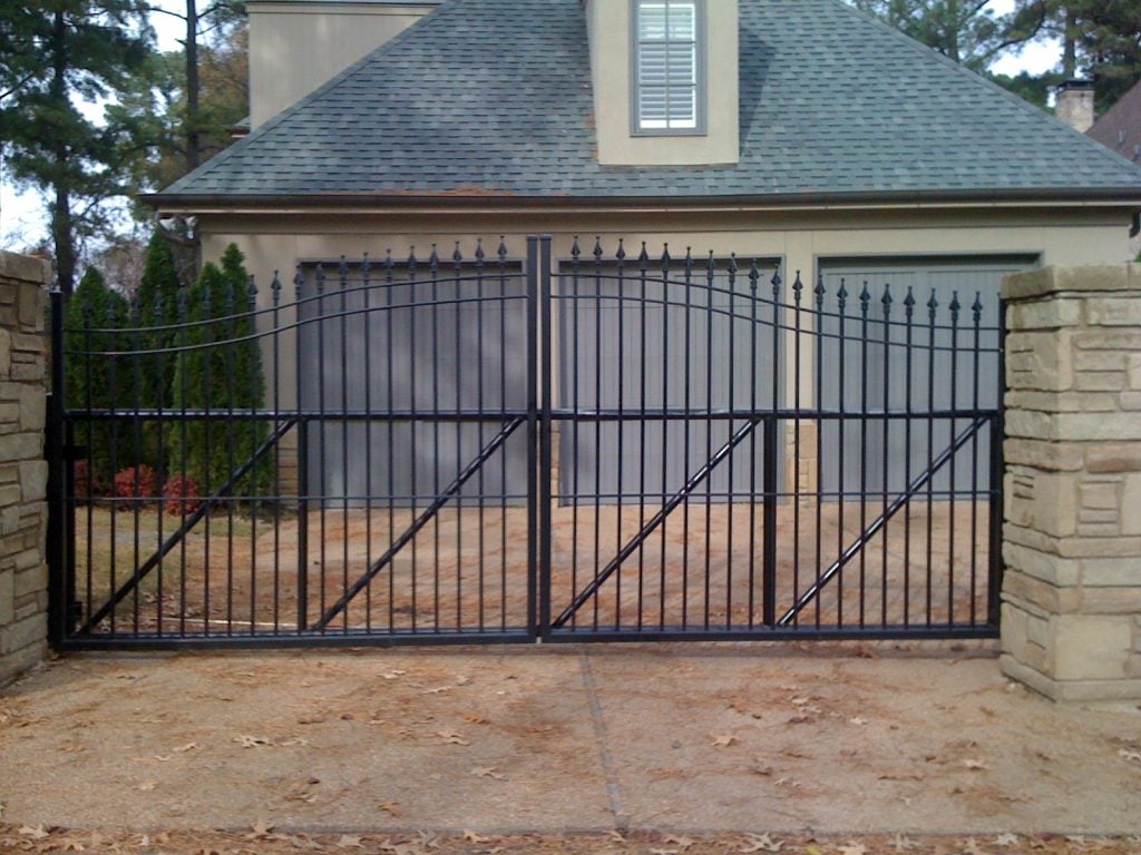 one-storey home with sliding gate entrance