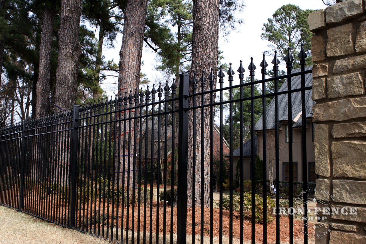 6ft Tall Signature Grade Iron Fence Used in Conjunction with Stone Masonry Pillars in a Front Yard Enclosure (Style #1: Classic)