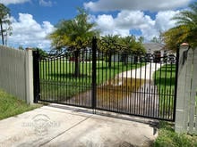 Stronghold Iron Driveway Gate with Custom Scroll Top Design